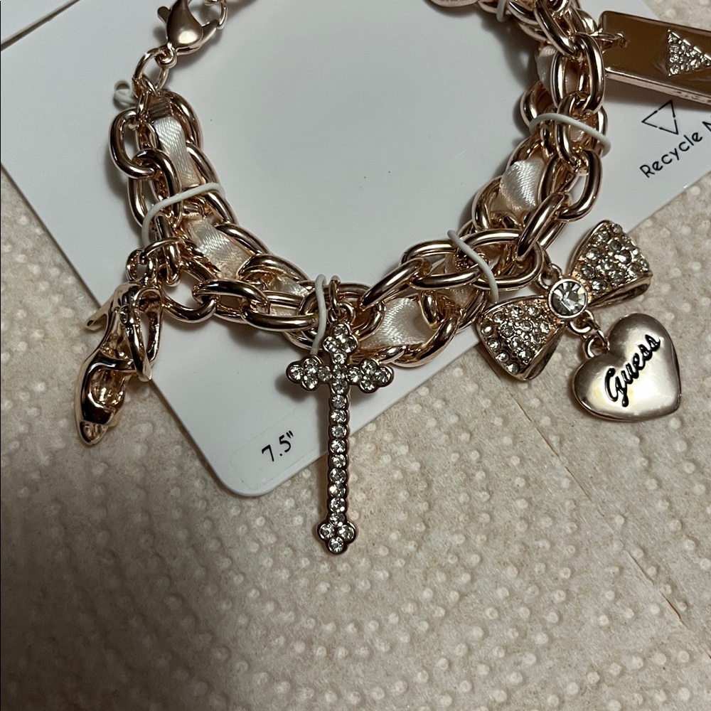 Guess Gold-Tone Charm Bracelet with Sparkling Accents - Picture 2 of 4